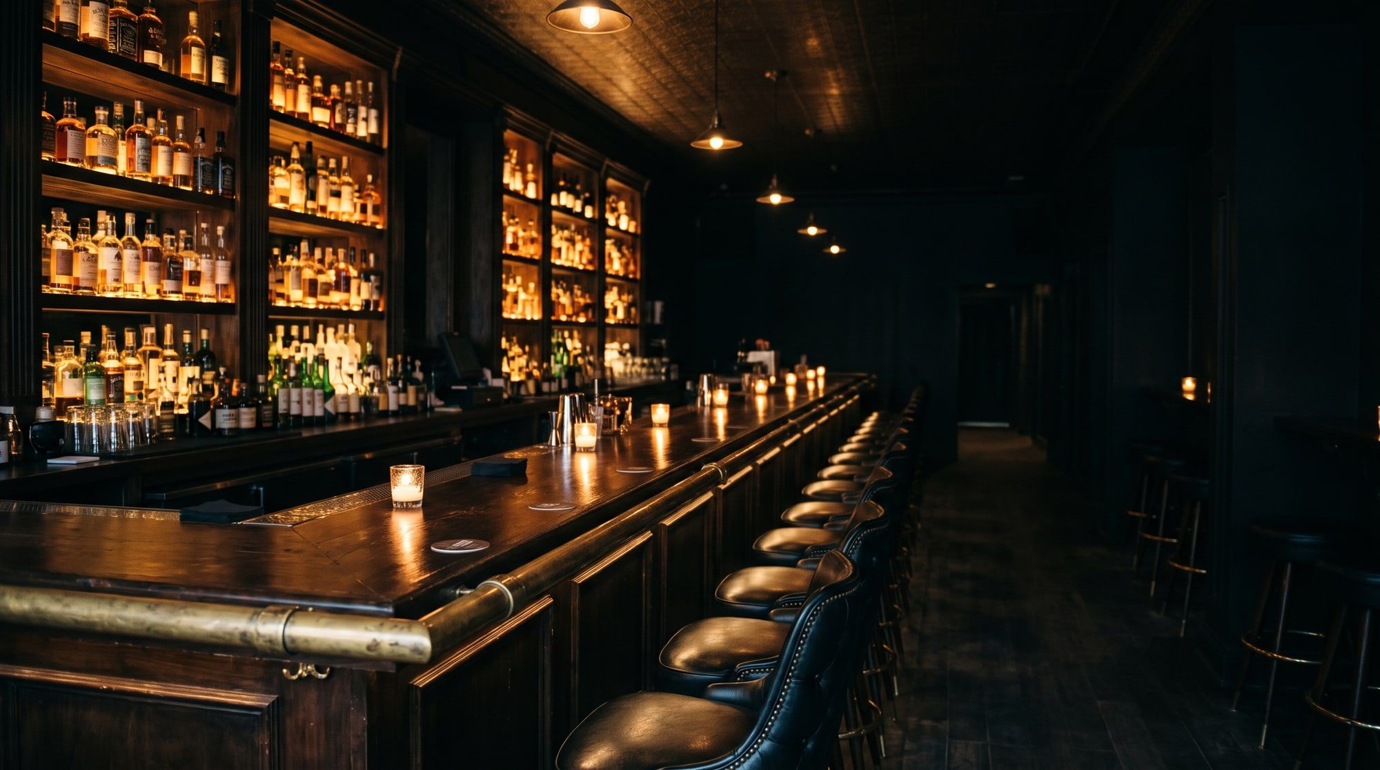 The bar, with bottles lit from behind